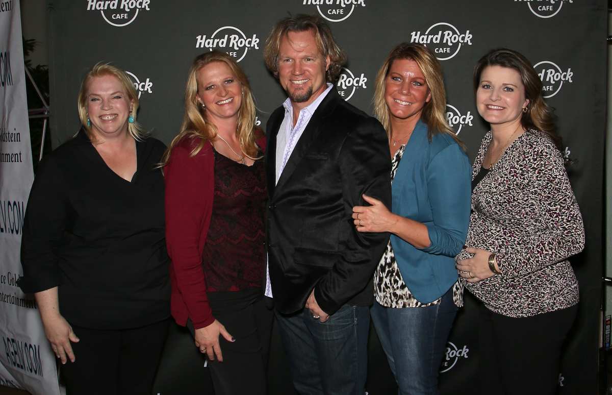 Television personalities Kody Brown (C) and his wives, (L-R) Janelle Brown, Christine Brown, Meri Brown and Robyn Brown, attend Hard Rock Cafe Las Vegas at Hard Rock Hotel's 25th anniversary celebration. Image Source: Photo by Gabe Ginsberg | Getty Images