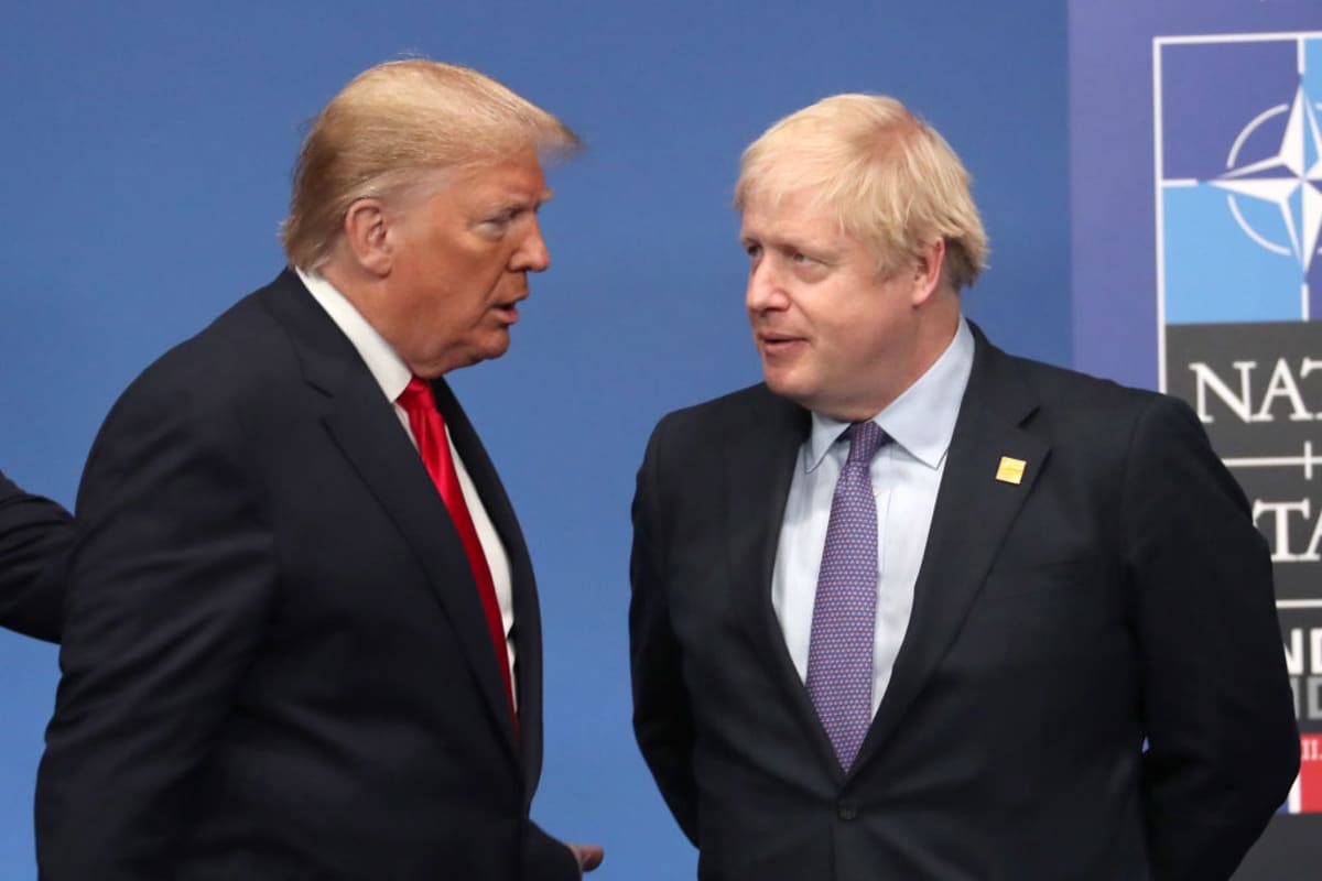 Donald Trump and Boris Johnson at the annual NATO Heads of Government summit on December 4, 2019, in England. (Image Source: Getty Images | Photo By Steve Parsons)