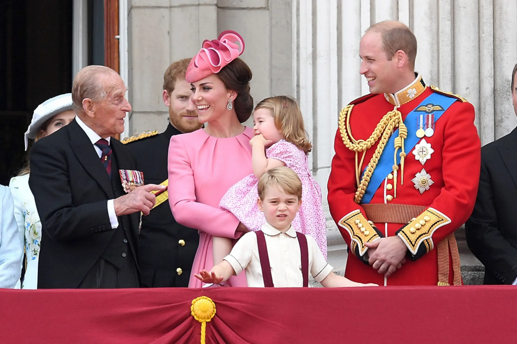 Prince Philip with Prince William and Kate Middleton and their children.