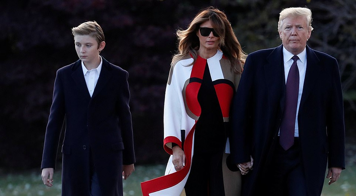 Barron Trump with Melania Trump and Donald Trump