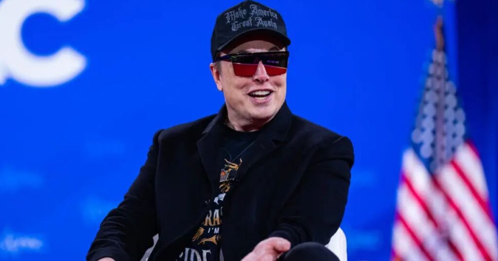 Elon Musk wearing shiny glasses and a black hat, which represents the Dark MAGA Movement (Credit: Eric Lee/The New York Times)