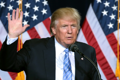 Donald Trump speaking to supporters at an immigration policy (Cover image source