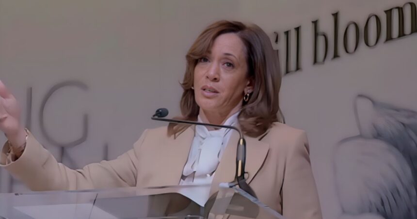 Kamala Harris giving a speech at a women's leadership conference in April 2025