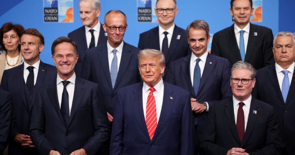 Donald Trump with other world leaders at NATO Summit