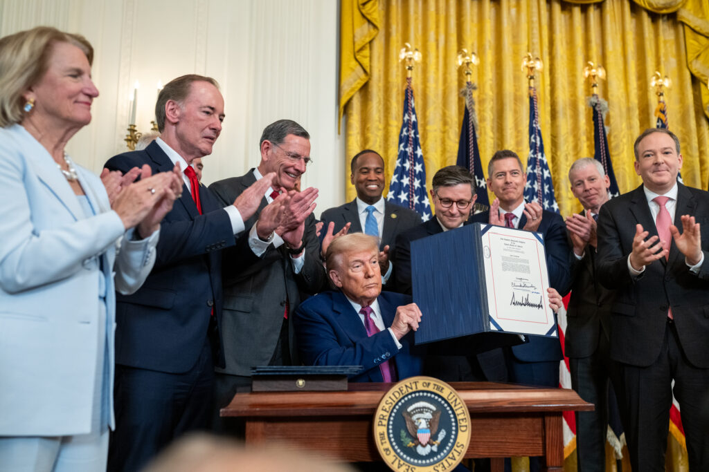 Donald Trump signing three congressional resolutions into law, ending California’s electric vehicle mandate and emissions standards