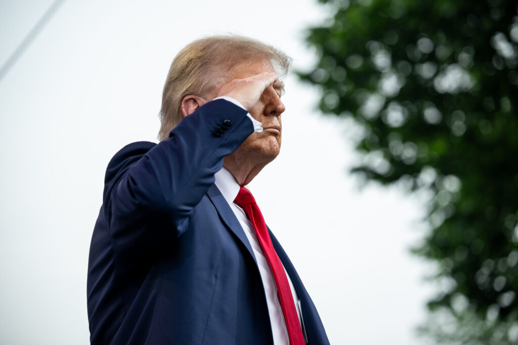Donald Trump saluting US Army during 20th anniversary parade