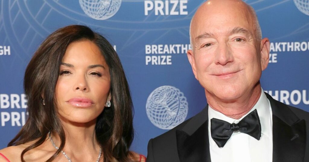 Jeff Bezos and Lauren Sanchez at an event