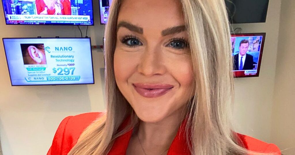Karoline Leavitt wearing red suit with visible eye makeup mistake during Newsmax appearance