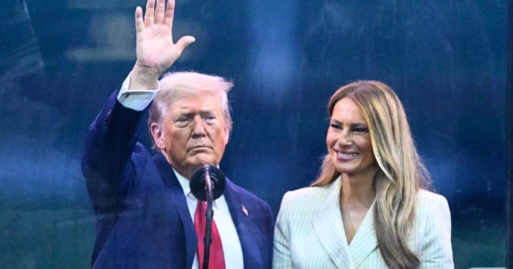 Melania Trump with Donald Trump during a lackluster military parade