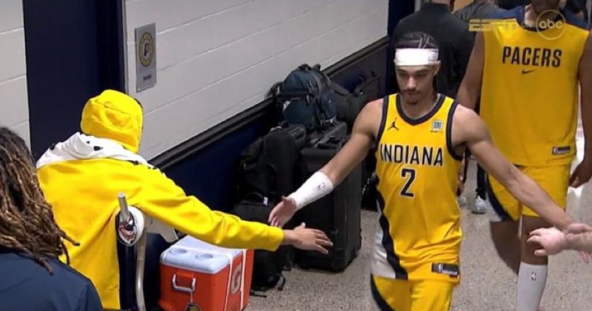 Tyrese Haliburton on crutches supporting his team
