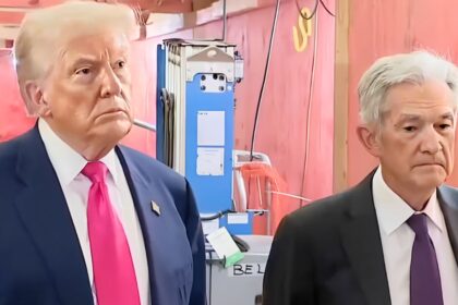 Donald Trump and Jerome Powell exchanging tense body language during Fed visit.