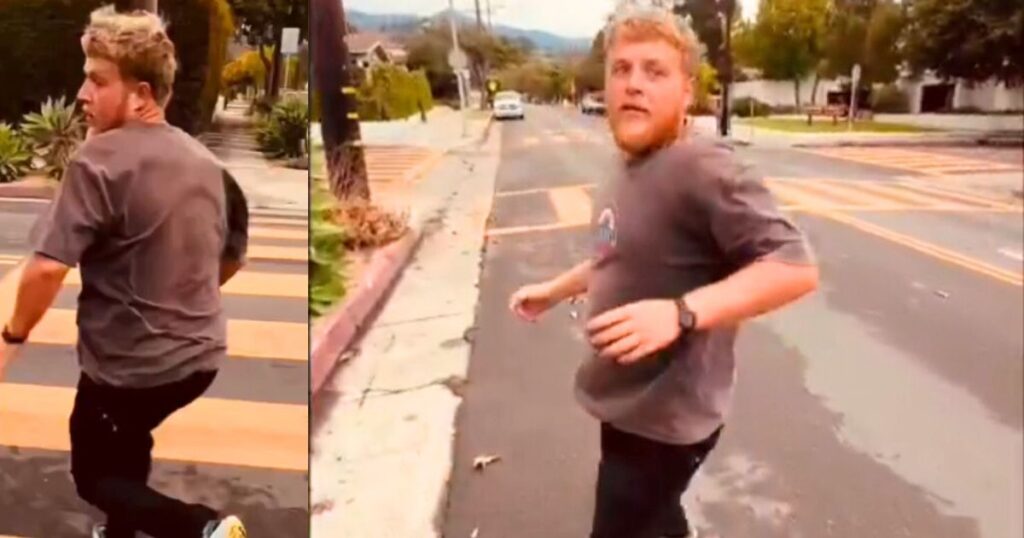 Black man closes in on a white man who abused him with a racial slur