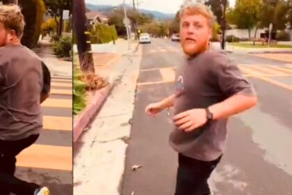 Black man closes in on a white man who abused him with a racial slur