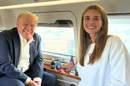 President Donald Trump’s granddaughter, Kai Trump, has accidentally opened up a secret the White House has been trying to hide for months. As usual, sharp eyes people think that the President's daughter, who is just 18-year-old and the daughter of Donald Trump Jr., have mistakenly disclosed something that has been the talk of the town for quite some time now, which concerns the president’s mysterious hand injury. The slip came on Wednesday when Kai shared a new carousel on Instagram, which at first glance seemed like a typical influencer-style post, trendy outfits, glossy selfies, and golf course throwbacks. But fans quickly zoomed in on one particular photo. Buried among the casual snaps was a picture of Kai and her grandfather celebrating election night at Mar-a-Lago, a moment that’s now raising eyebrows across social media. In the image, Trump’s right hand is clearly visible… and it looks strangely discolored, with orange-toned makeup or spray tan caked around his knuckles, seemingly to cover up purple bruising. The photo, originally posted in November, went unnoticed at the time. But after months of speculation about Trump’s health, online sleuths believe Kai may have accidentally confirmed what many suspected: that the discoloration and swelling started long before his official White House comeback. Trump himself addressed the bruise back in December 2024 during an interview with TIME, brushing it off with trademark bravado. “Shaking hands with thousands of people,” he said, claiming it was nothing more than wear and tear from constant rallies and greetings. But fans weren’t buying it, and the image has only reignited questions about what’s really going on behind the scenes. Since then, the hand has almost become a side character in Trump’s comeback tour, spotted during rallies as he pumps his fist in the air, or gripping golf clubs during weekend rounds at his properties. In July, the White House tried to calm the chatter, releasing a statement from Trump’s personal physician, Dr. Sean Barbabella, who said the marks were “consistent with minor soft tissue irritation from frequent handshaking and aspirin use.” Barbabella added that the aspirin was part of a “standard cardiovascular prevention regimen”, calling the bruises “benign and well known.” Still, insiders are whispering a different story. RadarOnline claims that those close to the president say he’s struggling more physically than he admits, with talk of possible mobility problems and even a future hip replacement on the horizon. The 79-year-old reportedly insists he’s fine, but sources told the outlet his health issues are “far worse than he admits publicly.” Meanwhile, granddaughter Kai continues to stand by his side, and behind the camera. She’s often seen filming her grandfather on the golf course, and sometimes joining in on the game herself. She’s even taking her golf dreams pro: Kai has committed to the University of Miami, joining the 2026 Hurricanes golf squad. Trump, of course, owns 17 golf courses around the globe, from the US to Scotland to Dubai, and his Doral resort in Miami is set to host a PGA Tour signature event next season with a jaw-dropping $20 million prize pool. But for now, all eyes are on one thing: that mysterious hand, the makeup that tried to hide it, and the granddaughter who might’ve just blown the cover.