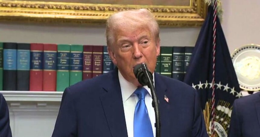 Donald Trump at a press podium making remarks about Democrats and Tylenol.