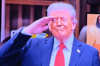 Donald Trump smirks after being booed during the U.S. Open men’s final.