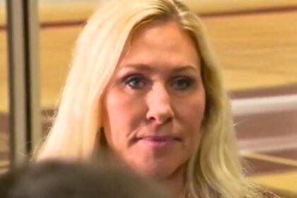 Marjorie Taylor Greene addresses reporters during a Capitol Hill press event.