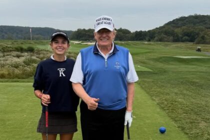 Kai Trump with her grandfather Donald Trump.
