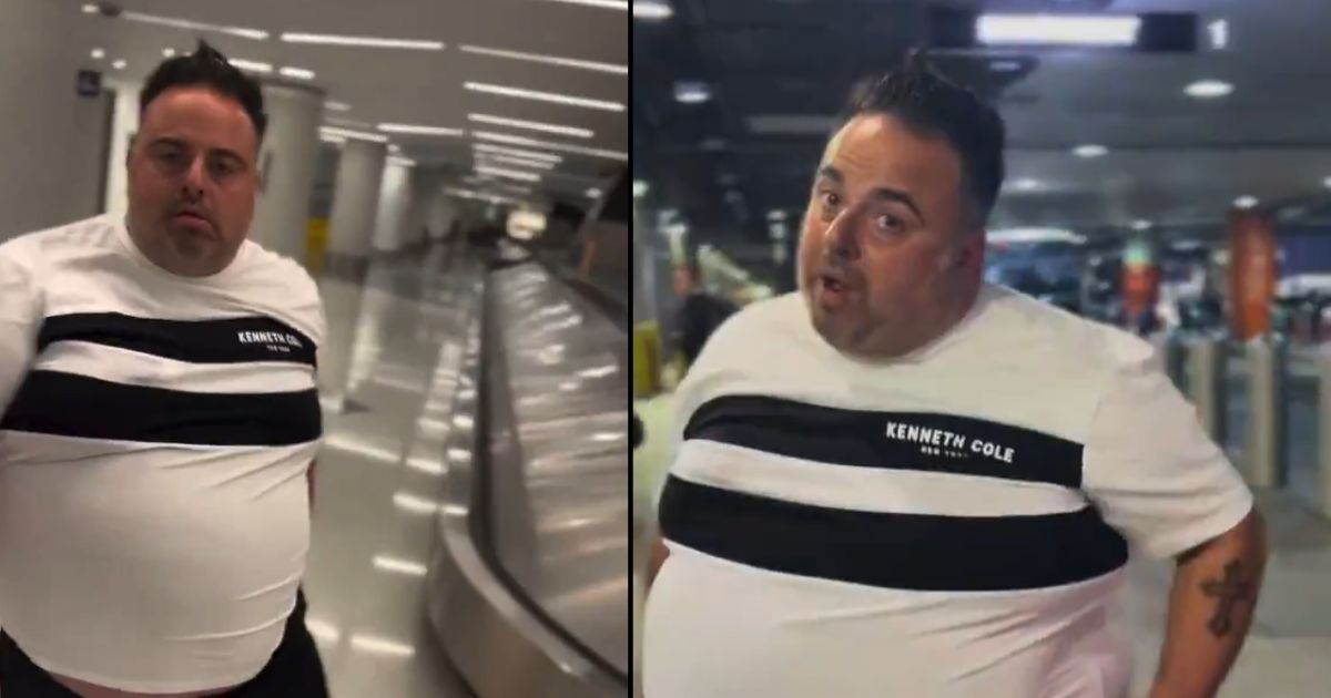 White man follows black man at airport, uses racist slur while the latter remains calm