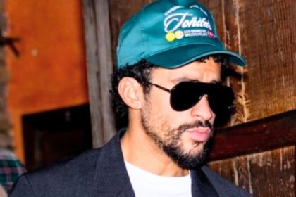 Bad Bunny strolling into the SNL afterparty in style