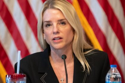Pam Bondi’s awkward chin tilt needs a major lesson while posing