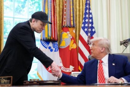 Elon Musk pictured with Donald Trump