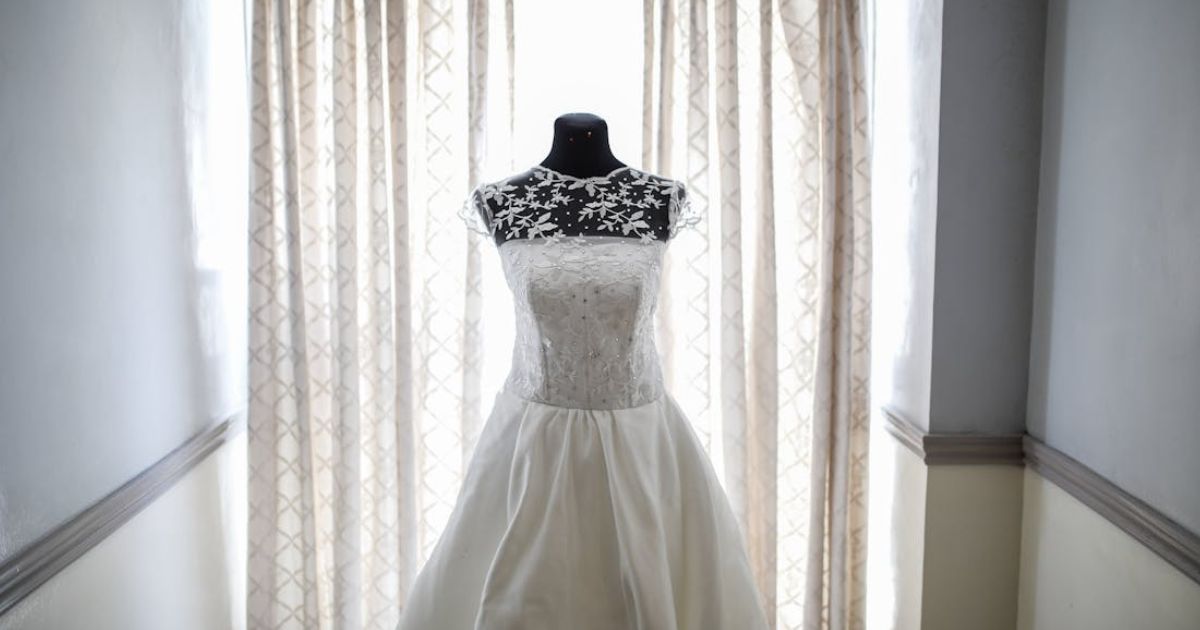 A Reddit user asks AITA after she called her friend's wedding dress ugly.