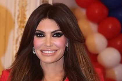 Kimberly Guilfoyle smiling at an event