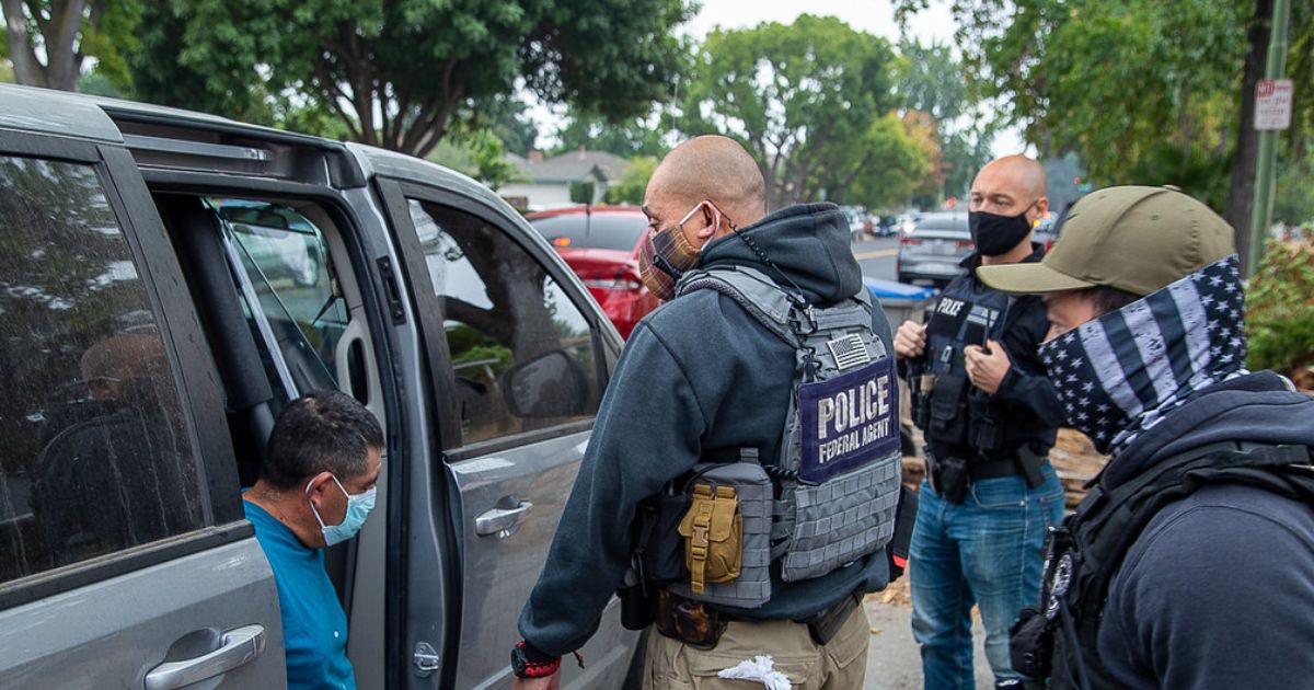 ICE agent reportedly pulls a firearm on a female motorist amid warning of imposters from FBI
