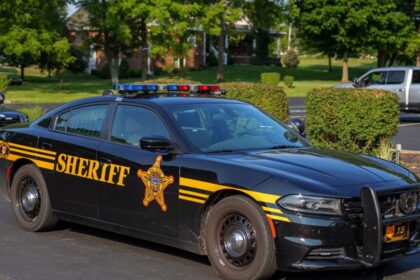 Deputy fired after posting photo mocking Black people while on duty, sheriff says.