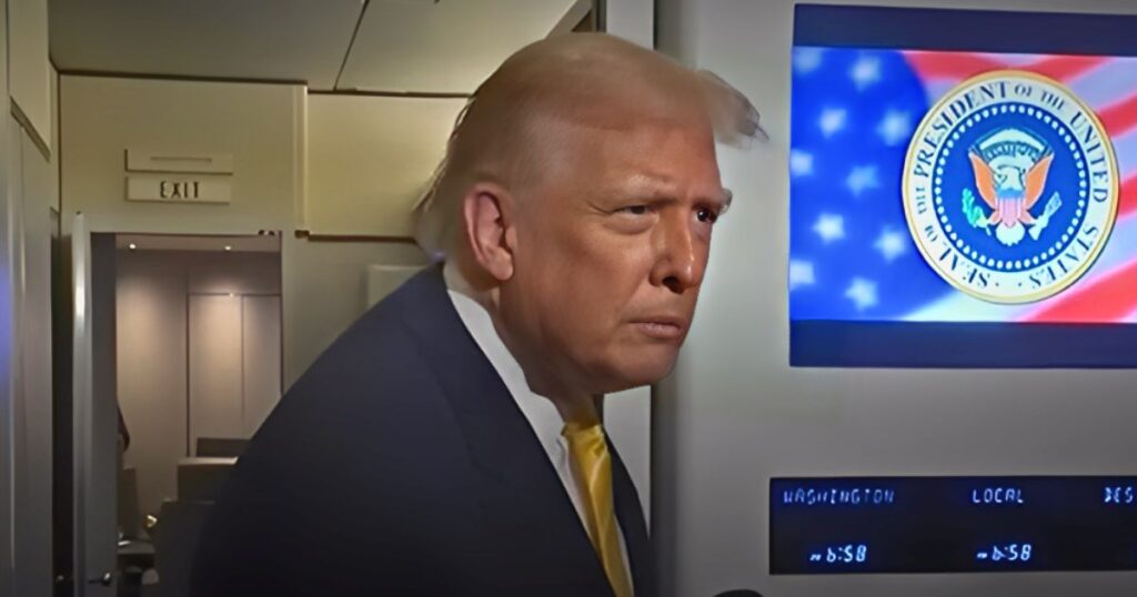Donald Trump aboard Air Force One, where a brief exchange sparked a viral debate over whether he said “piggy” or “Peggy”