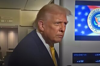 Donald Trump aboard Air Force One, where a brief exchange sparked a viral debate over whether he said “piggy” or “Peggy”