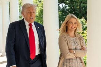 Donald Trump pictured with Karoline Leavitt.