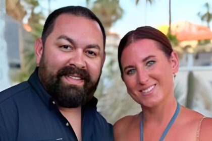 Photo of Michael Duarte smiling with his wife Jessica