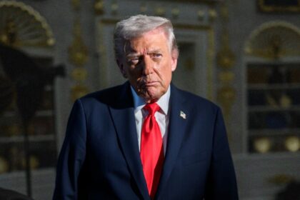 Trump administration sued for loyalty test