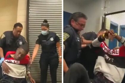 Cops dragging Black man into a cell immediately after a severe injury
