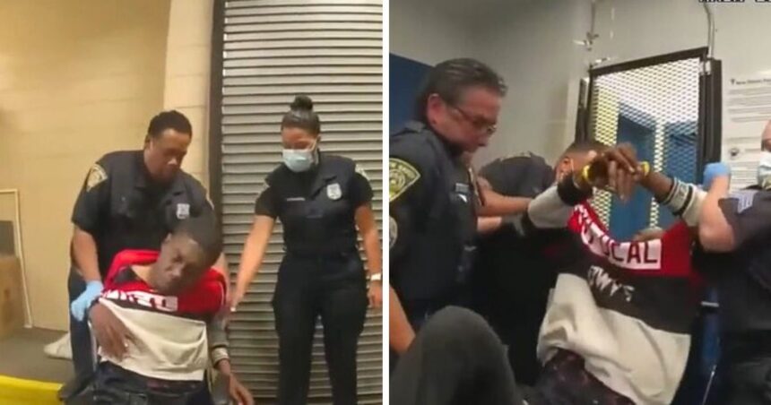 Cops dragging Black man into a cell immediately after a severe injury