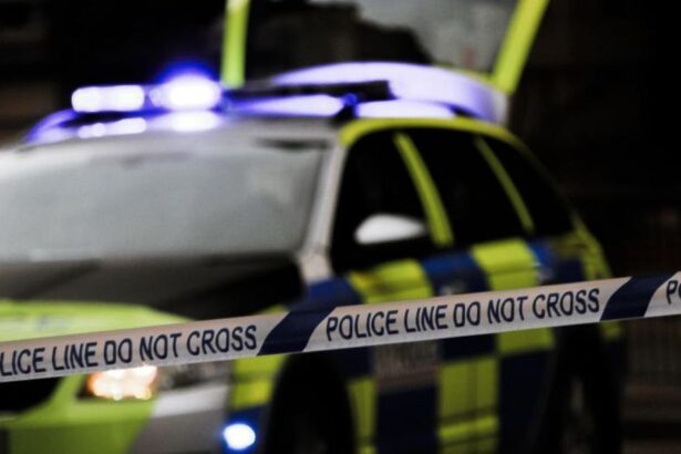 Man booked for pointing a gun towards a group of children singing Christmas carols at his door