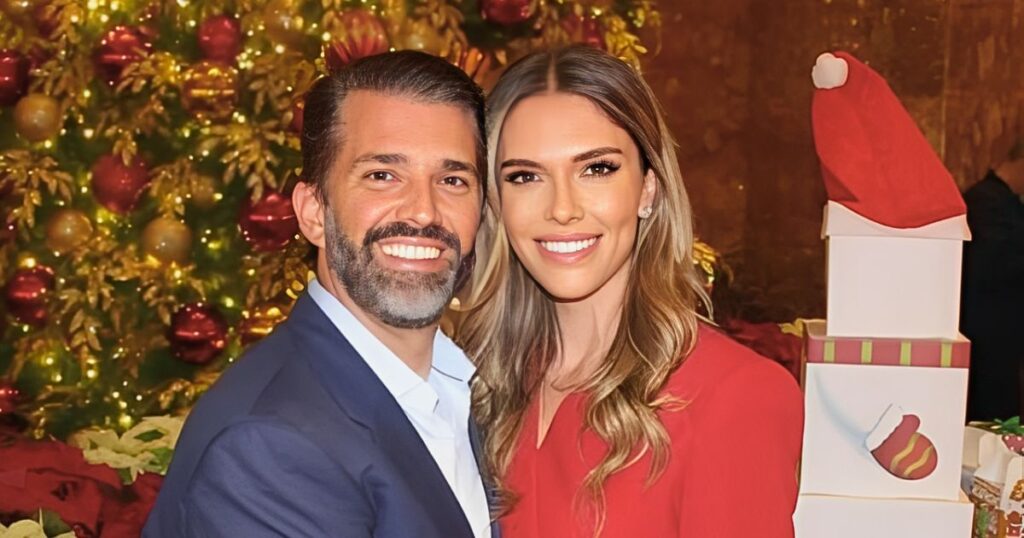 Donald Trump Jr. and Bettina Anderson pose together at the Trump Tower Christmas party in New York