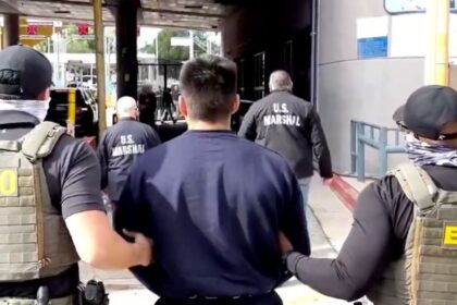 ICE agents detained Minnesota teenager handcuffed by ICE officers while they arrested his father