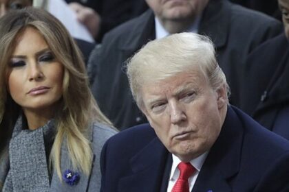 Melania and Donald Trump’s fake PDA moment