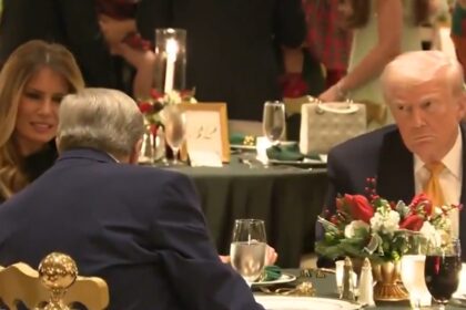 Melania and Donald Trump at Christmas party.