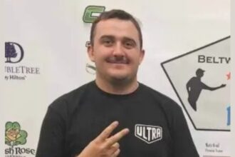 National Guardsman Andrew Wolfe showing a sign