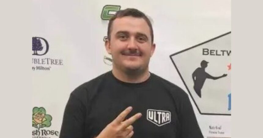 National Guardsman Andrew Wolfe showing a sign