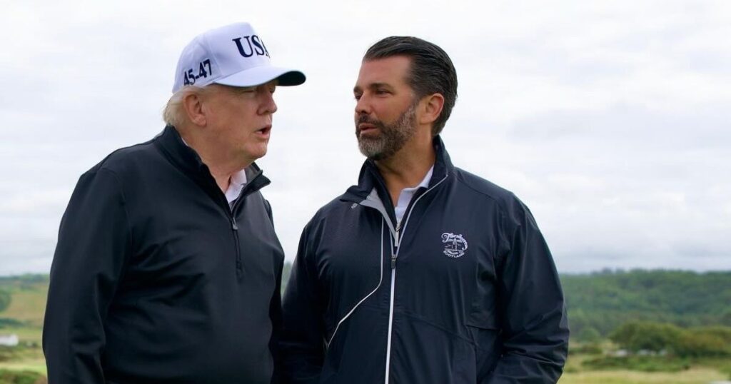 President Donald Trump’s onstage jab at AmericaFest puts his son Don Jr. on the spot. (@KUWTTRUMPS- X.com).