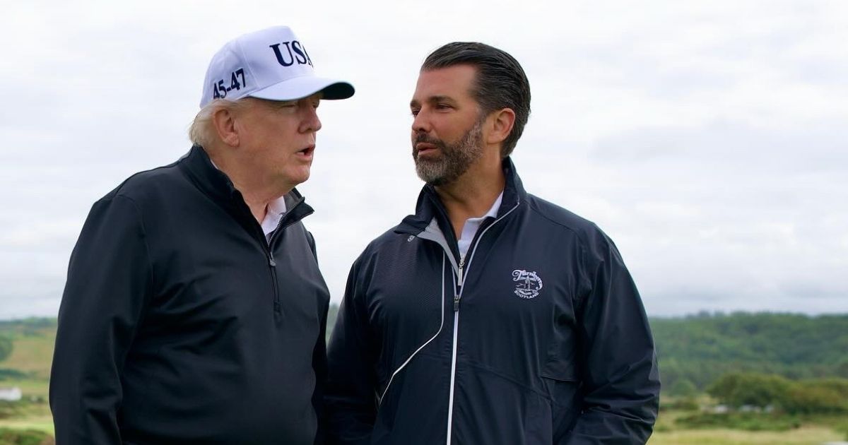 President Donald Trump’s onstage jab at AmericaFest puts his son Don Jr. on the spot. (@KUWTTRUMPS- X.com).