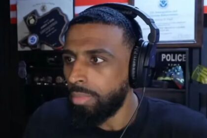 Redditors claim black podcaster deserved being blocked from entering TPUSA event.