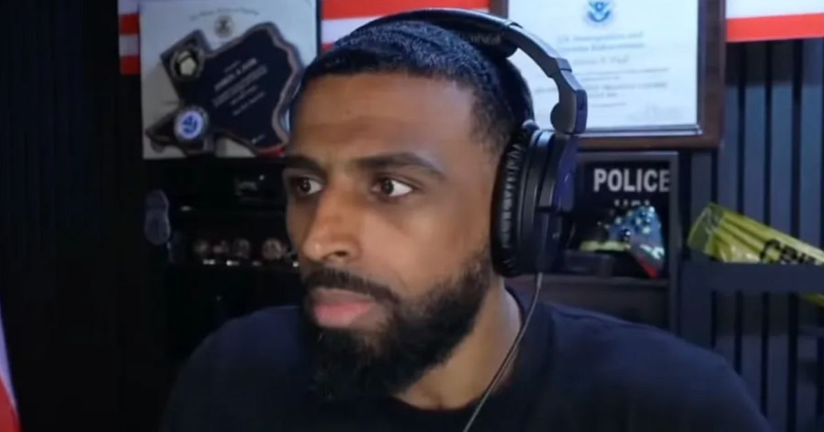 Redditors claim black podcaster deserved being blocked from entering TPUSA event.