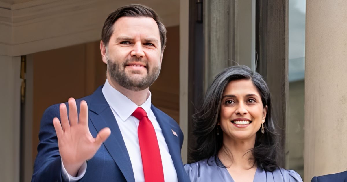 Vice President JD Vance is standing beside his wife, Usha Vance, during a public appearance