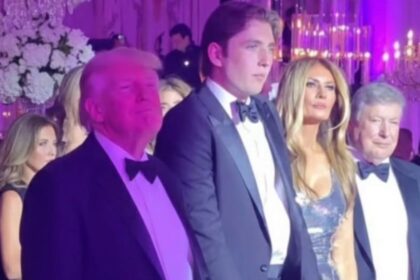 Barron Trump with his parents at Mar-a-Lago